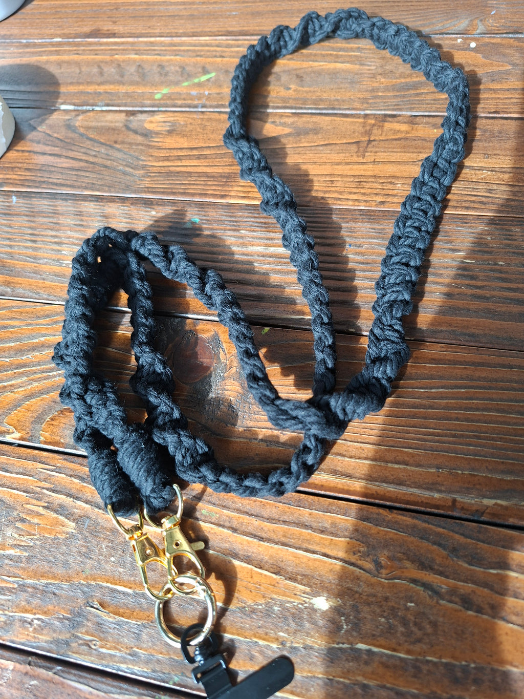 Handykette schwarz gold
