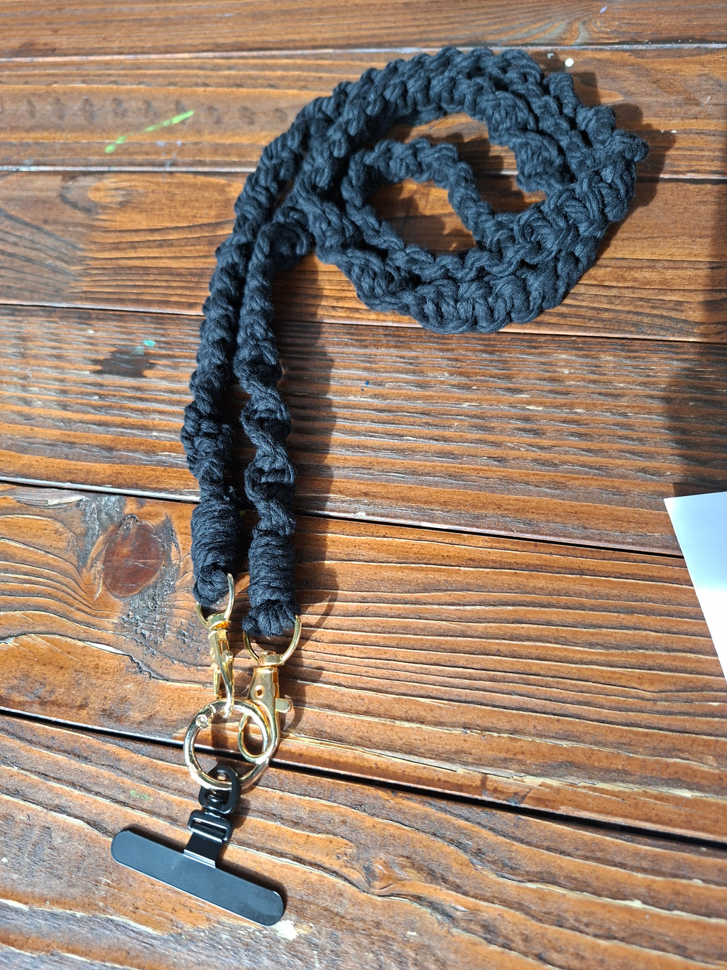 Handykette schwarz gold